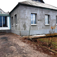 добротный дом в Березановке с большим участком